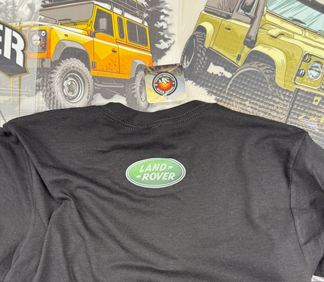 Black t-shirt with Land Rover logo on a background of yellow Land Rover vehicles.