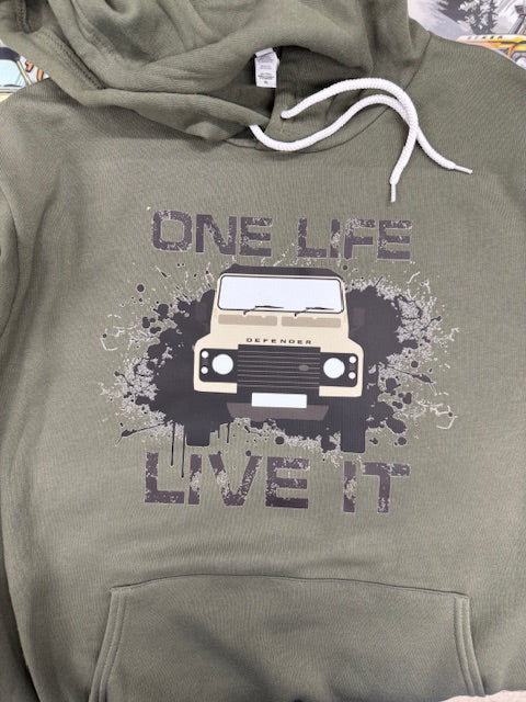 Green hoodie with graphic design and text on a plain background