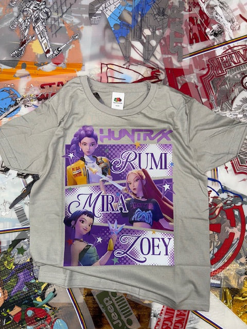 Gray t-shirt with a colorful graphic design on a collage background