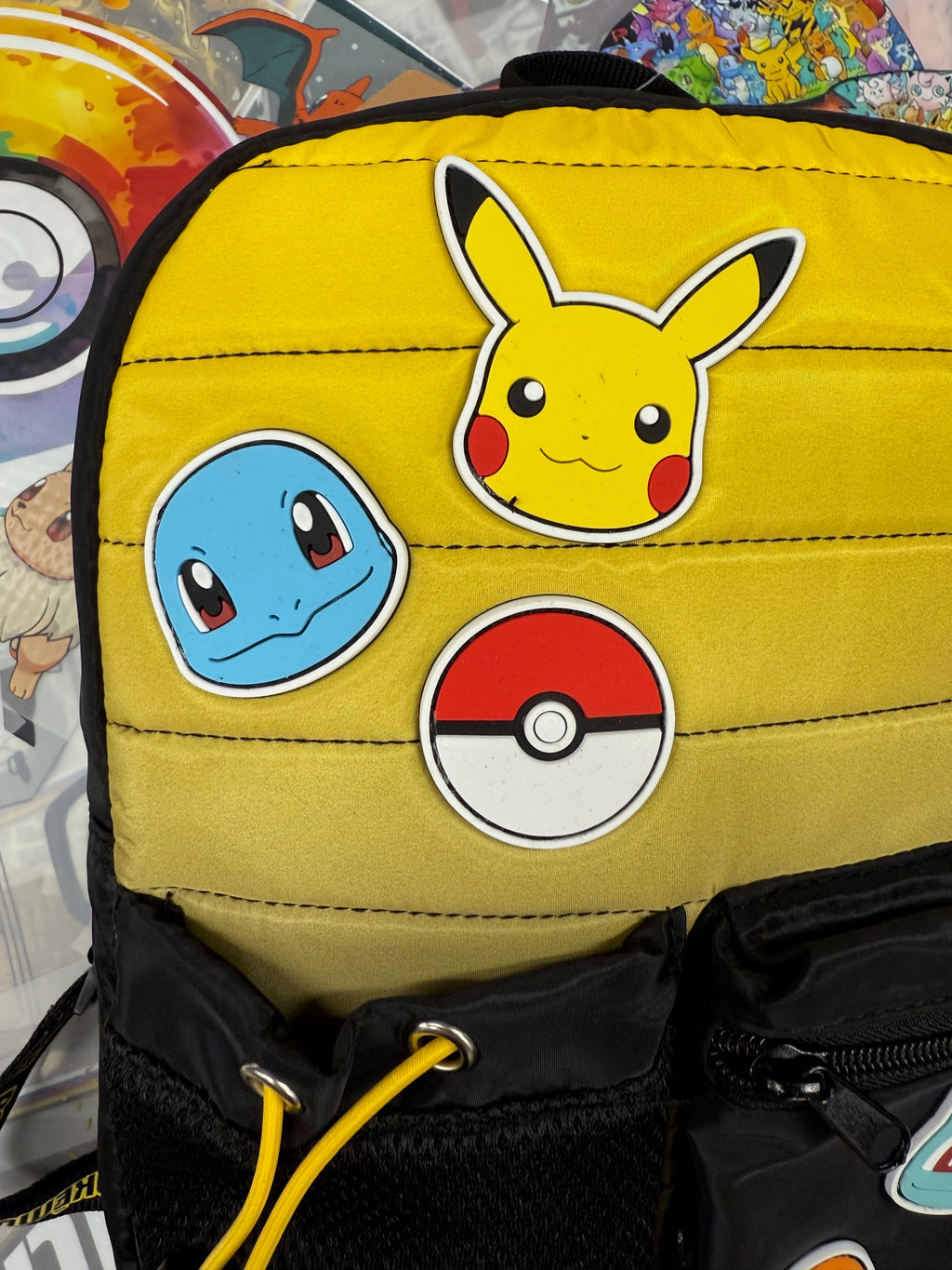 POKEMON PADDED BLACK AND YELLOW MINI BACKPACK